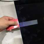 Lifting up Apple iMac screen continue