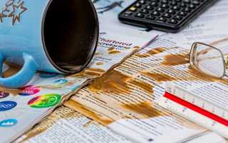 Coffee spill on work papers
