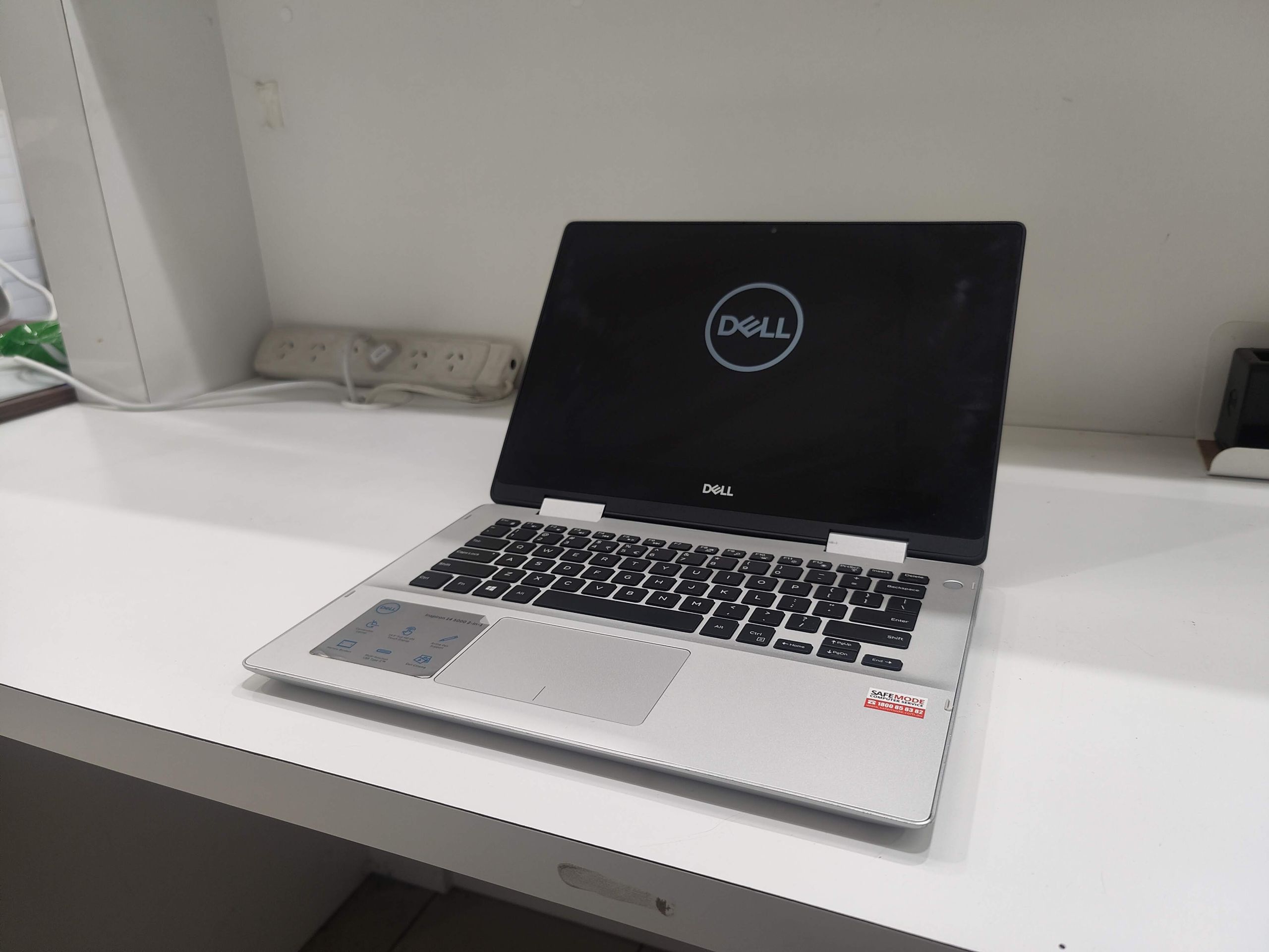 Picture of a Dell Inspiron 14 with Charging Problem Picture of a Dell Inspiron 14 with Charging Problem