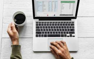 Laptop user with coffee