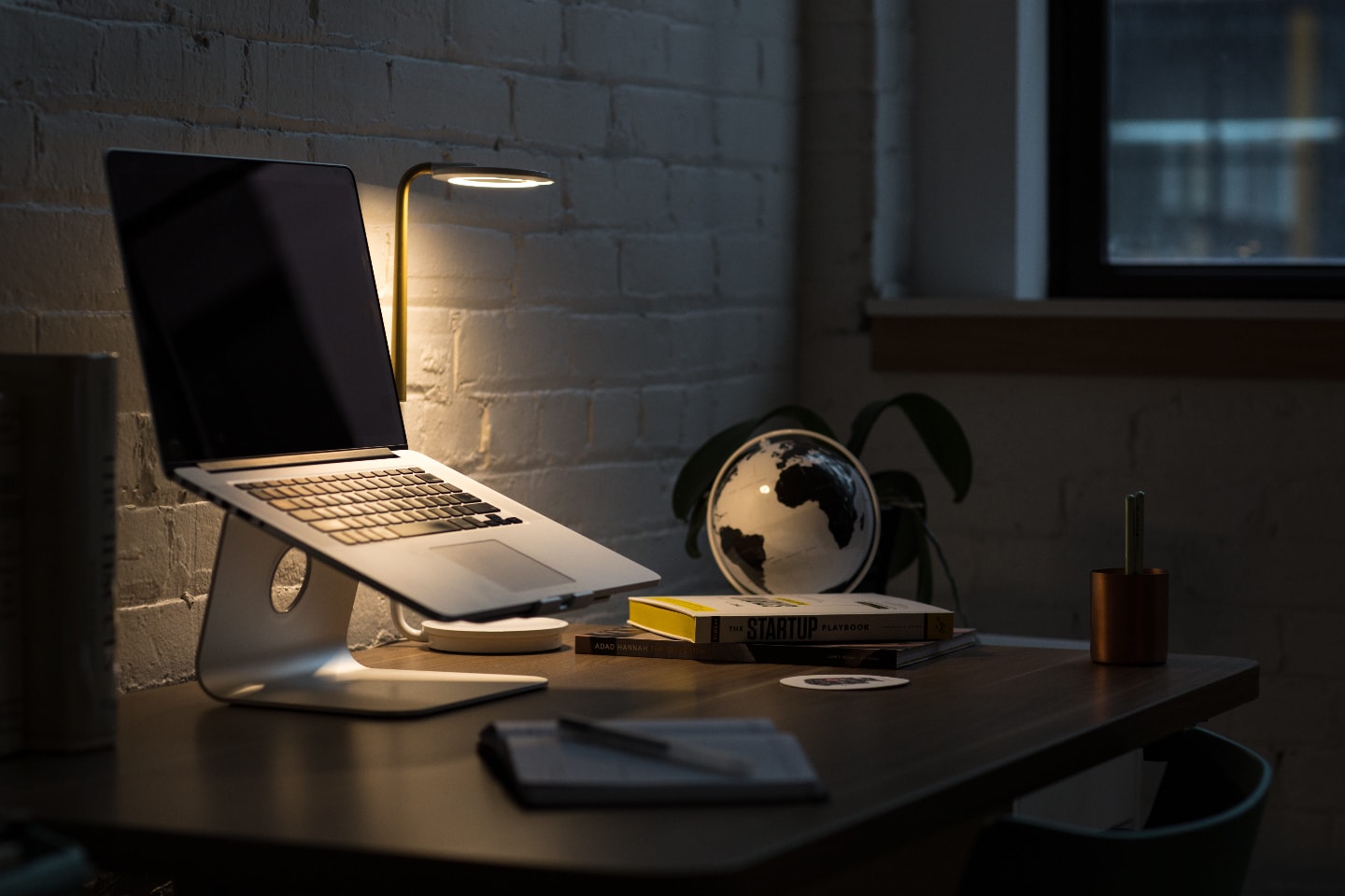 Macbook on laptop stand