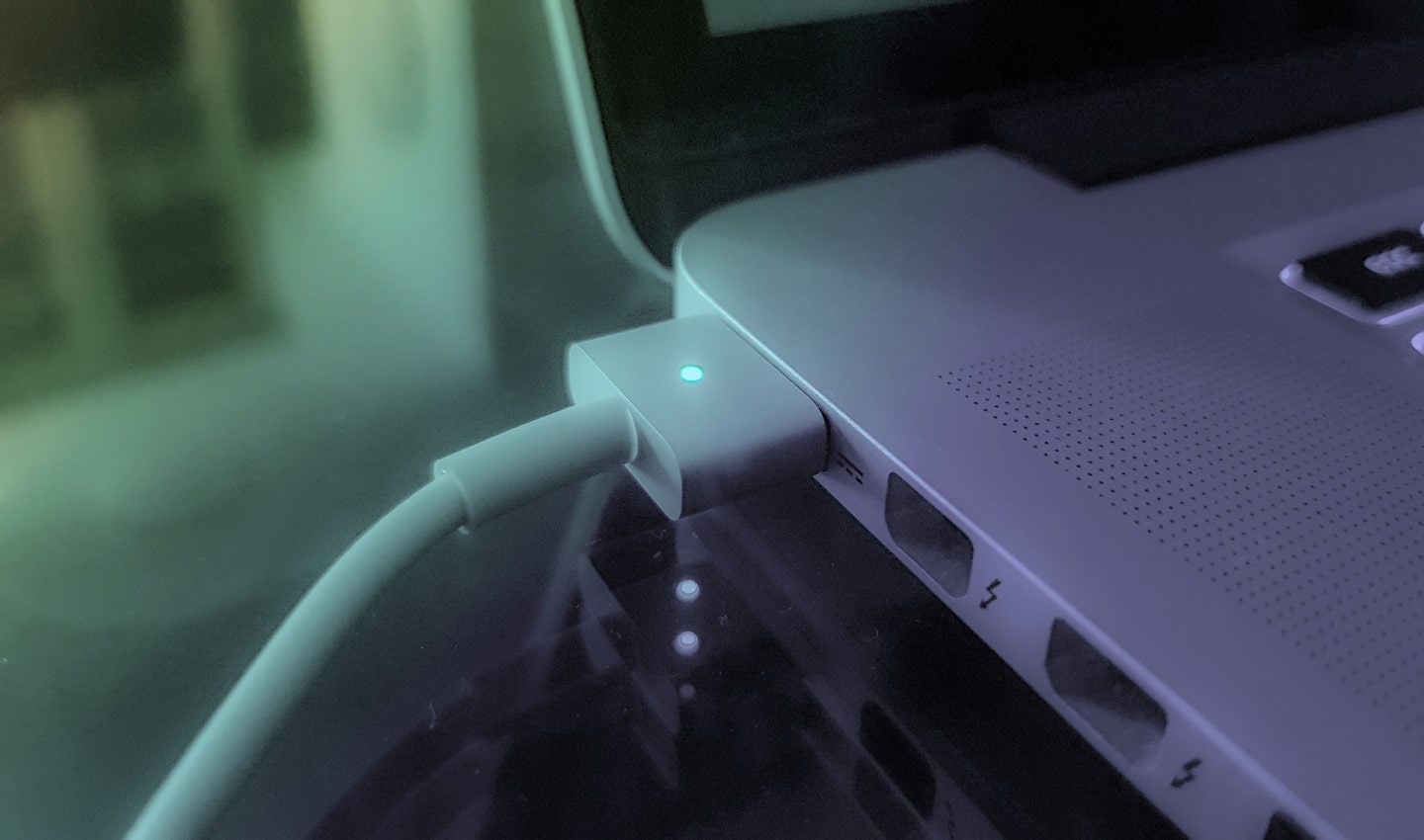 Apple Macbook laptop plugged in and charging