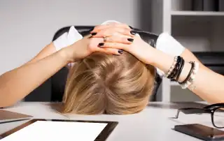 woman frustrated with computer